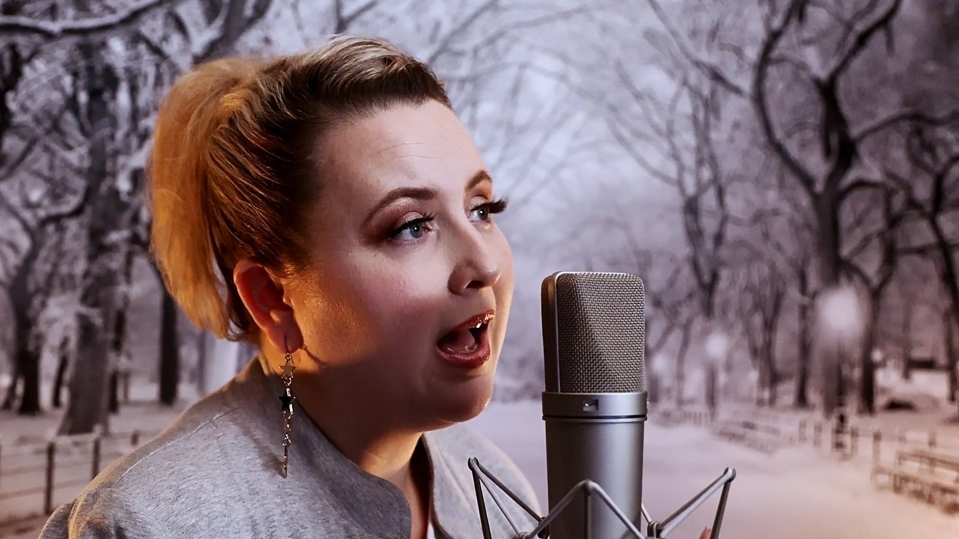 Tamara Arbeau singing in the Don't Know Why music video
